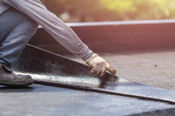Professional Exterior Waterproofing technician working in Charlottesville, VA